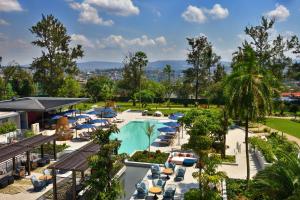 an overhead view of the pool at the resort at Mövenpick Kigali in Kigali
