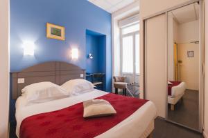 Postel nebo postele na pokoji v ubytování Hotel Christian