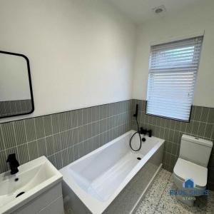 Koupelna v ubytování Woodville House By Blue Skies Stays