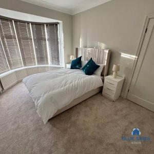 Postel nebo postele na pokoji v ubytování Woodville House By Blue Skies Stays + 3 fotografie