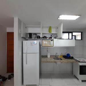 Η κουζίνα ή μικρή κουζίνα στο Apartamento em João Pessoa +11 φωτογραφίες