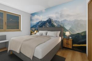 Ένα ή περισσότερα κρεβάτια σε δωμάτιο στο ZILLERELLA - Opening December 2025