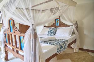 Postel nebo postele na pokoji v ubytování Garden Villa