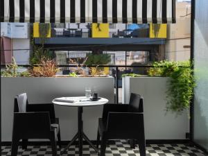 Posezení v ubytování The Pal Living in a Concept