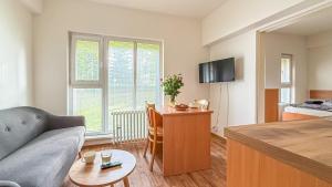 TV a/nebo společenská místnost v ubytování Penzion a ubytovna Oáza