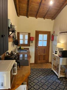 Kuchyň nebo kuchyňský kout v ubytování Casa dos Figos vistas fantásticas + 17 fotografií