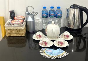 Příslušenství pro přípravu čaje a kávy v ubytování Bảo Quân Hotel + 21 fotografií