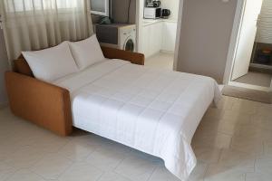 Ένα ή περισσότερα κρεβάτια σε δωμάτιο στο Katerina's House