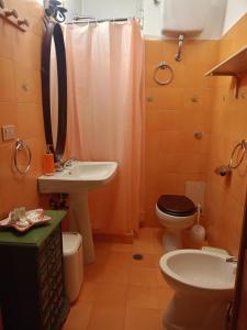 Koupelna v ubytování Fiocco di neve, residence Magnola + 37 fotografií