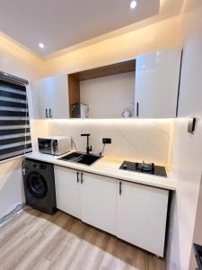 Η κουζίνα ή μικρή κουζίνα στο Citi Residence