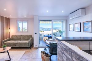 Et opholdsområde på 11 Terra Bella - Appt Climatisé