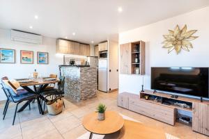 Køkken eller tekøkken på 11 Terra Bella - Appt Climatisé