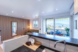 Et opholdsområde på 11 Terra Bella - Appt Climatisé