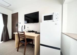 Μια τηλεόραση ή/και κέντρο ψυχαγωγίας στο ゲストハウスイコット種子島