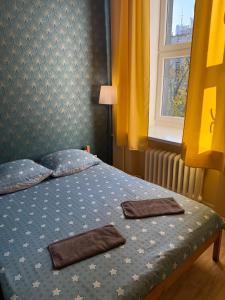 Postel nebo postele na pokoji v ubytování Oliwka Hostel + 15 fotografií