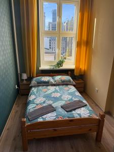 Postel nebo postele na pokoji v ubytování Oliwka Hostel