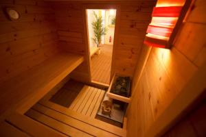 an overhead view of a sauna with a dog in it at Studio loft avec sauna in Leysin
