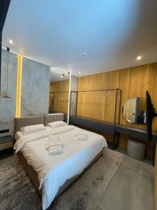 Giường trong phòng chung tại Osocor Village +37 ảnh