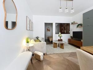 TV a/nebo společenská místnost v ubytování Le Sienna - Centre ville et gare