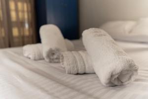 Ένα ή περισσότερα κρεβάτια σε δωμάτιο στο Manolia