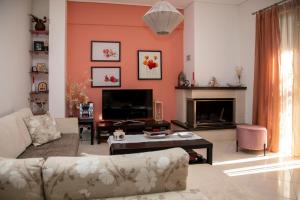 TV a/nebo společenská místnost v ubytování Harision Residence