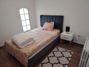 Postel nebo postele na pokoji v ubytování Dalton's villa avec piscine