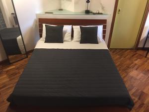 Postel nebo postele na pokoji v ubytování B&B Treviglio
