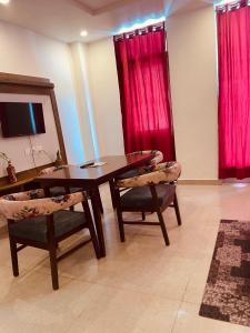 Posezení v ubytování The Orio Cloudberry Kasauli