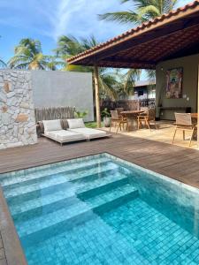 Πισίνα στο ή κοντά στο Luxo, Conforto & Piscina no Refúgio do Igarapé