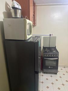 Η κουζίνα ή μικρή κουζίνα στο Home Sweet Home