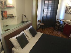 Postel nebo postele na pokoji v ubytování B&B Treviglio
