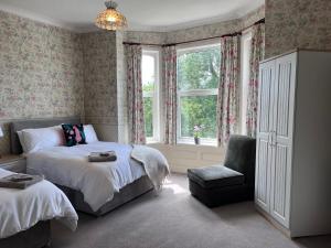 En eller flere senge i et værelse på 2 Claremont Villa