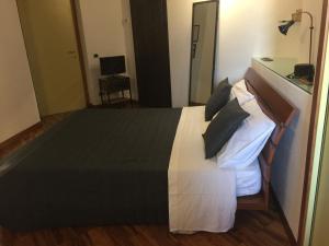 Postel nebo postele na pokoji v ubytování B&B Treviglio