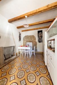 Kuchyň nebo kuchyňský kout v ubytování B&B Pascal House Nuoro_IUN E5016
