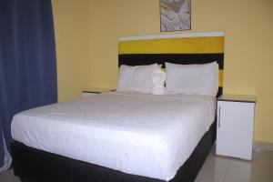 Ένα ή περισσότερα κρεβάτια σε δωμάτιο στο Blue Ridge Escape Guest House