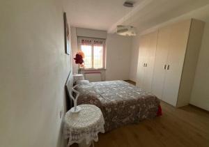 Ένα ή περισσότερα κρεβάτια σε δωμάτιο στο Casa Respiro di Langa