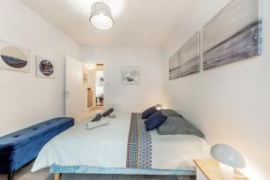 Postel nebo postele na pokoji v ubytování Maison de bourg