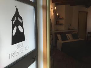Postel nebo postele na pokoji v ubytování B&B Treviglio