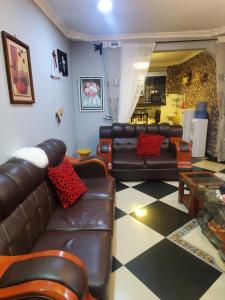 Posezení v ubytování divine favour homestay