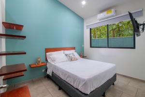 Ένα ή περισσότερα κρεβάτια σε δωμάτιο στο Casa do Mar