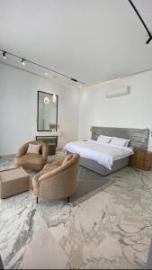 Ένα ή περισσότερα κρεβάτια σε δωμάτιο στο شاليه هوانا