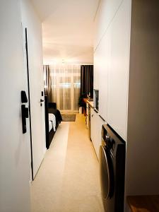 TV a/nebo společenská místnost v ubytování Axiom Suites - Zenith II - Netflix, HBO, Champagne