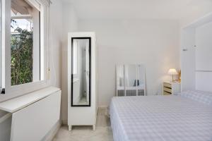 Ένα ή περισσότερα κρεβάτια σε δωμάτιο στο Atico playa de Rota