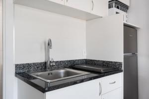 Η κουζίνα ή μικρή κουζίνα στο Atico playa de Rota +15 φωτογραφίες