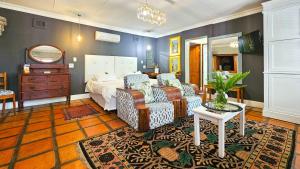 Χώρος καθιστικού στο De Opstal Country Lodge