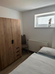 Postel nebo postele na pokoji v ubytování Apartma Center Ljutomer