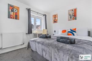 Ένα ή περισσότερα κρεβάτια σε δωμάτιο στο Heather's House