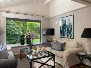 Et opholdsområde på Holiday Home With Pool Between Beach And Forest