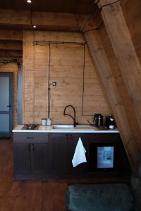 a kitchen with a sink and a counter top at Chalet Myler in Yeghipatrush +62 photos