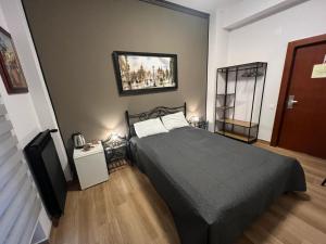 Postel nebo postele na pokoji v ubytování Hotel Reina